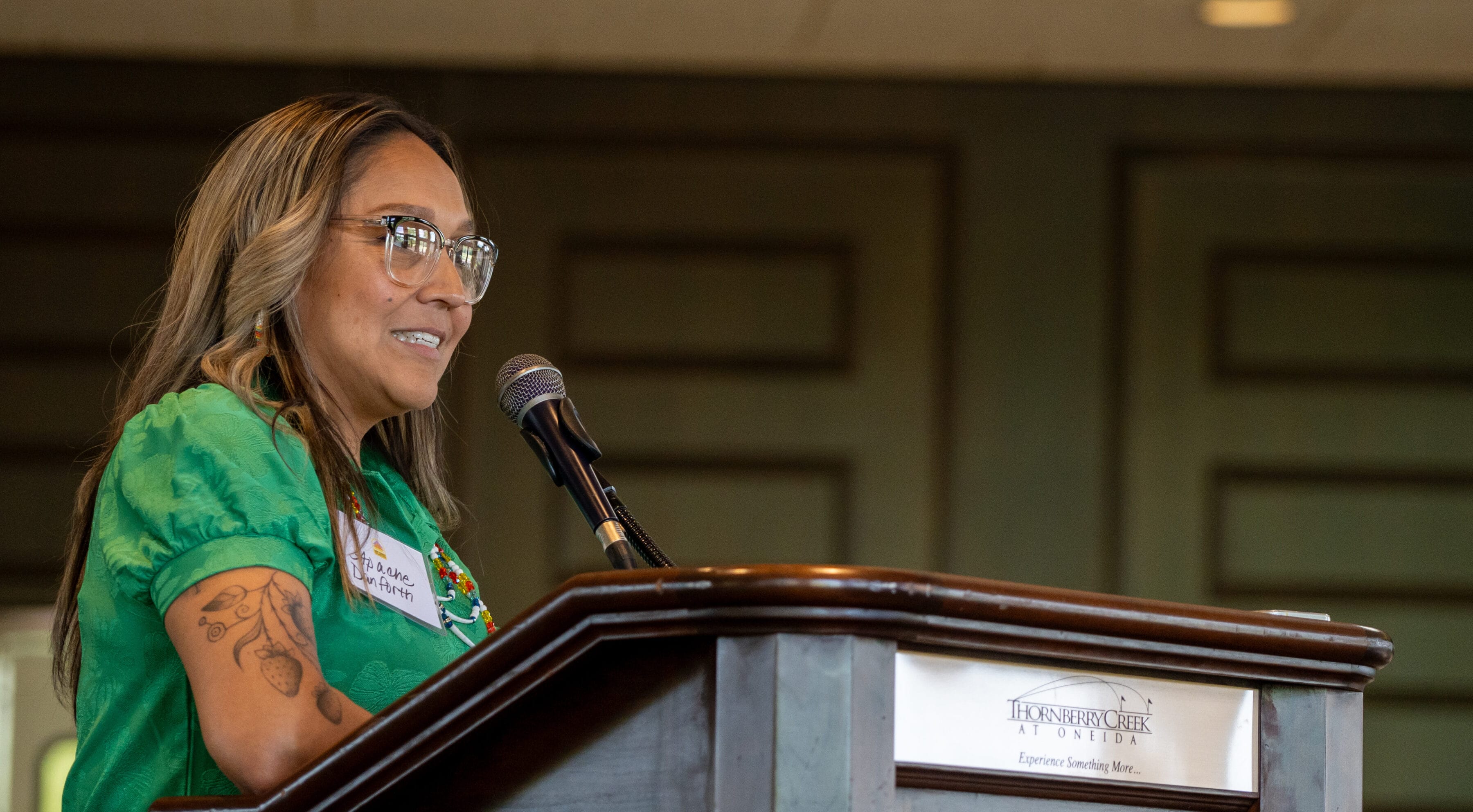 Photo of Apache Danforth speaking at a bootcamp event.